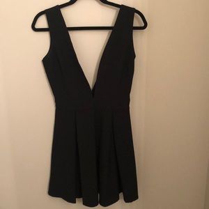 Black sleeveless deep V dress